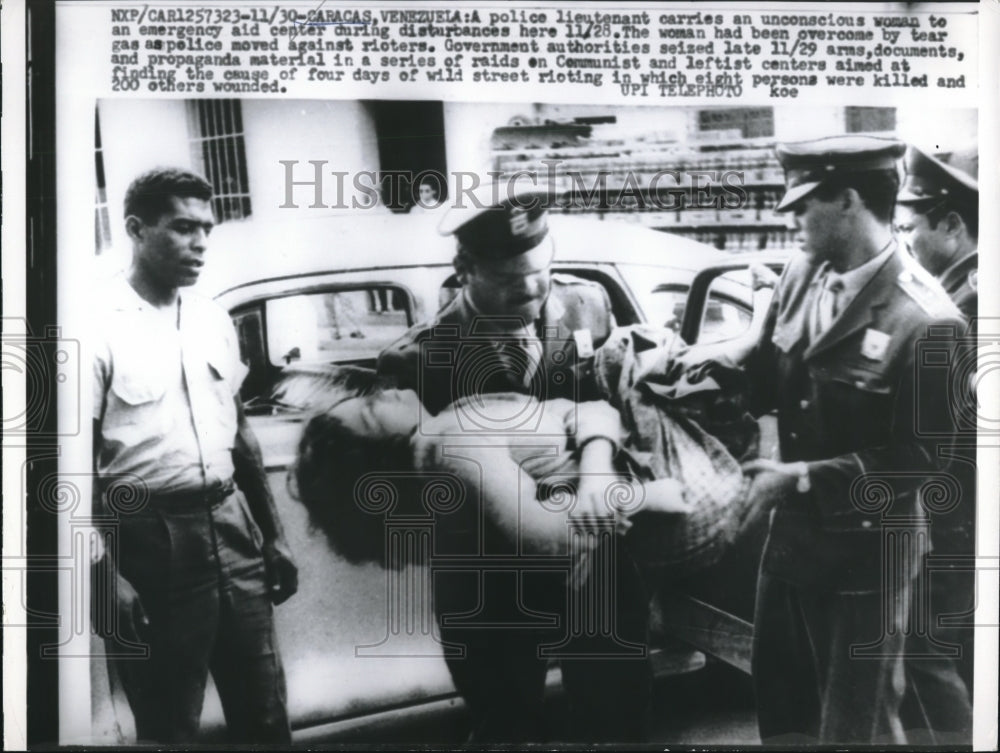 1959 Caracas, Venezuela, rioting & police with tear gas victims - Historic Images