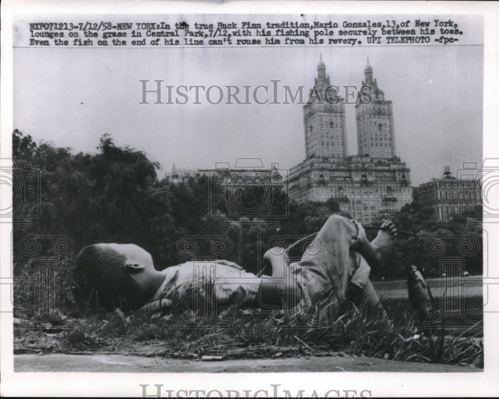 1958 Press Photo NYC, Mario Gonzales fishing in Central Park lake - Historic Images