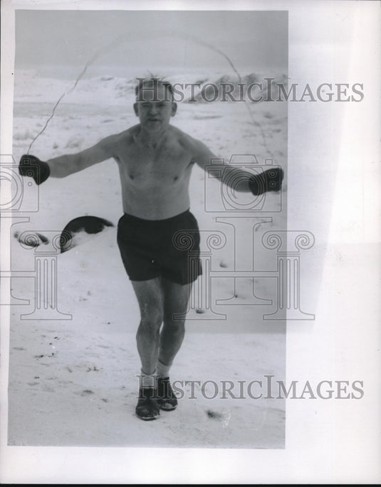 Press Photo Theodore Mihail taking a bath in chilly waters of Cleveland. - Historic Images