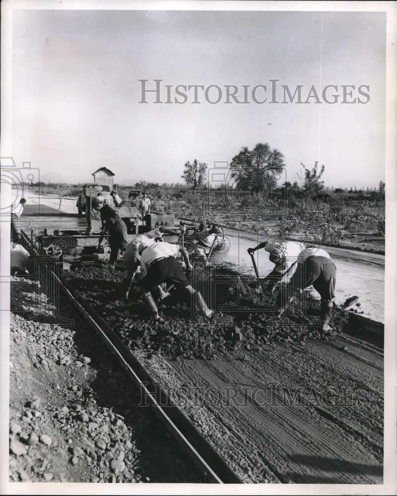 1952 modern concrete paver in action-Historic Images