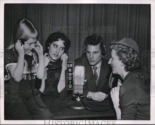 1952 NYC, family of US Amb to UN, Ernest Gross listen to radio - Historic Images