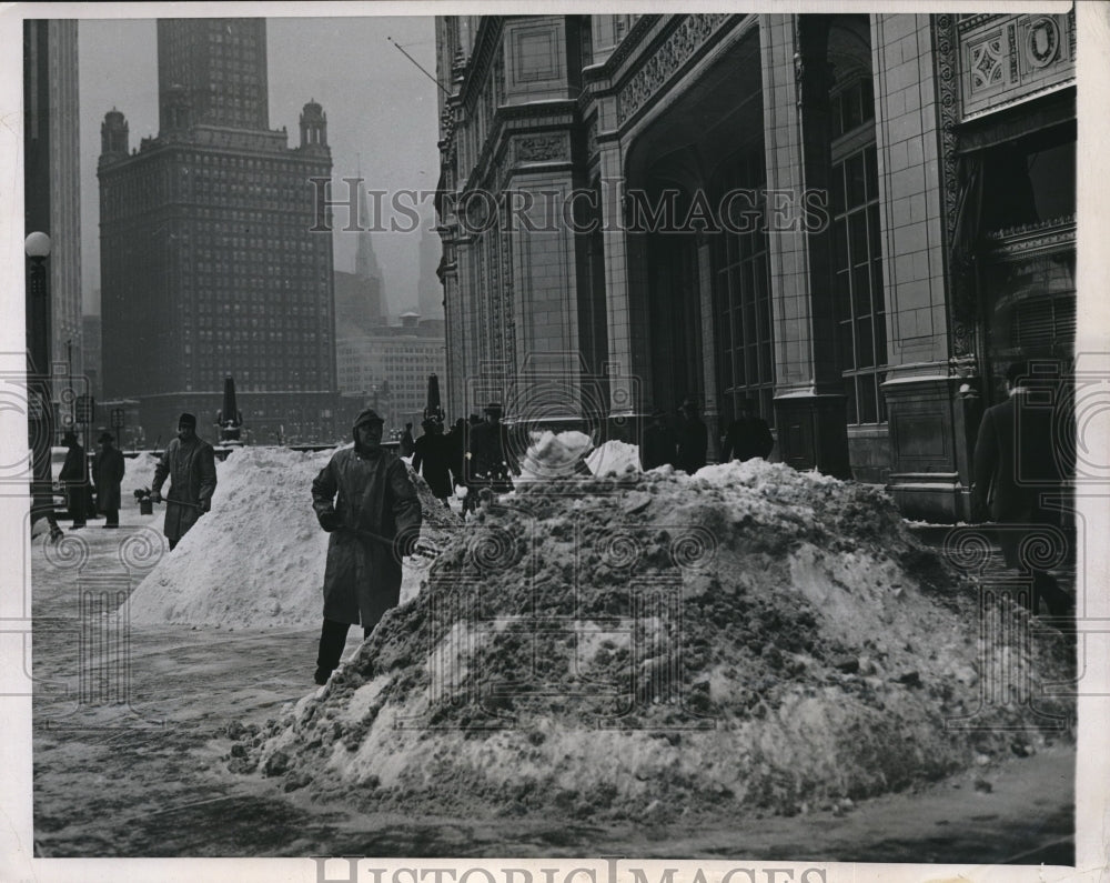 1947 Workmen clearing sidewalk in Michigan Boulevard in Chicago-Historic Images