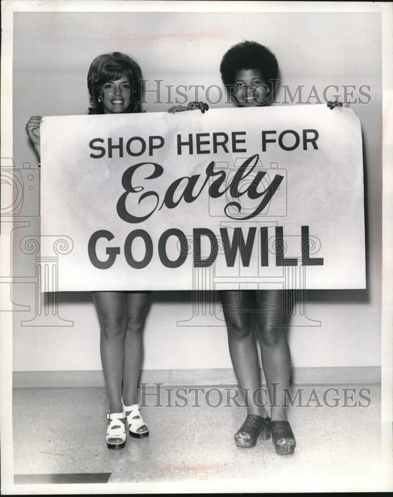 1973 Goodwill secretaries promote Early Goodwill shopping, Cleveland - Historic Images