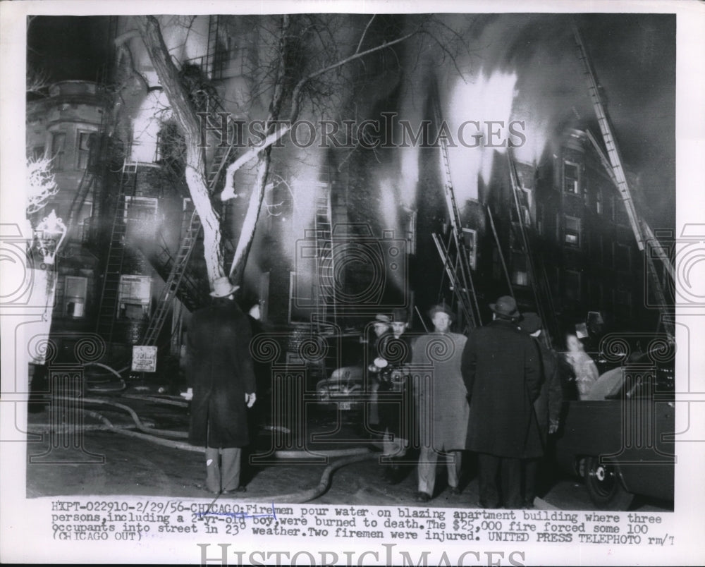 1956 Press Photo Firemen at the scene of an apartment building fire in Chicago-Historic Images