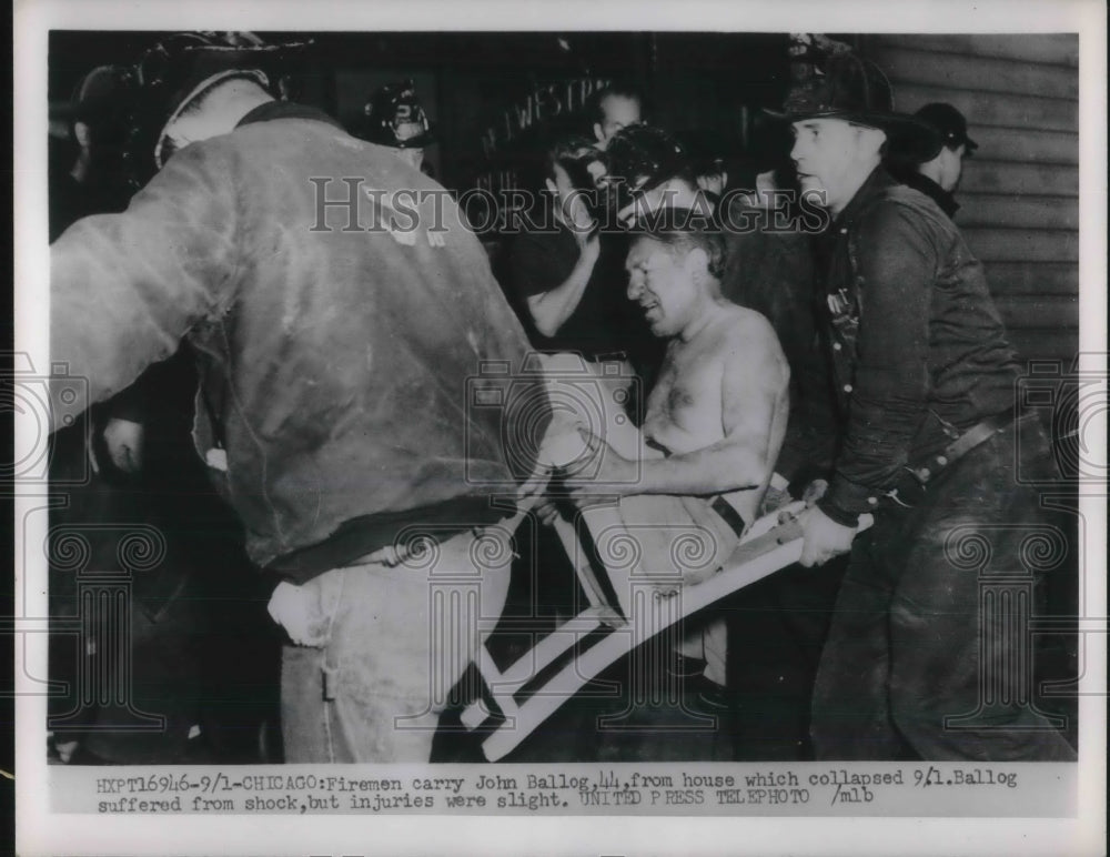 1952 Press Photo Firemen Carry John Ballog From Collapsed House Chicago, IL - Historic Images