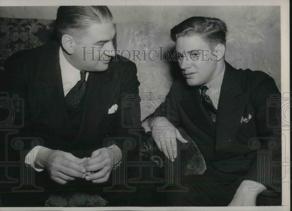 1938 Lynn Waldorf &amp; Bill De Correnout conferring w/ each other - Historic Images