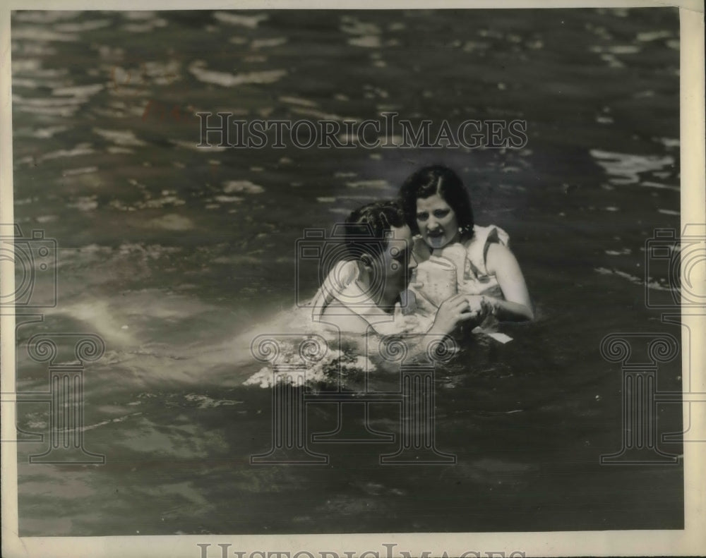 1934 Charles Pearson Jr &amp; bride nee Surname in a river - Historic Images