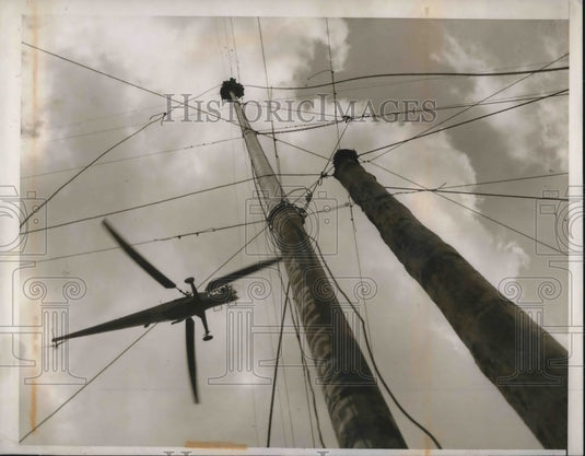 1948 helicopter interview of flagpole sitter m Jacobs in Cosnodtion - Historic Images