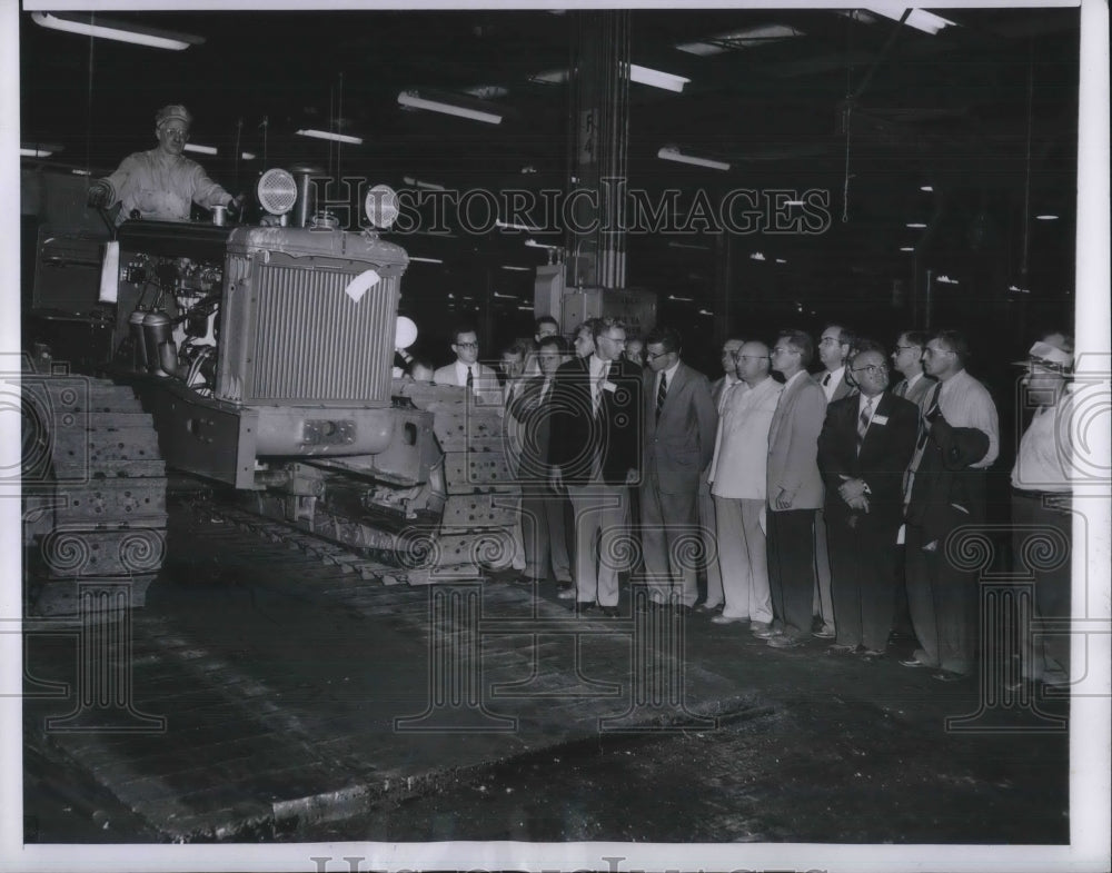 1955 IH tractor in Chicago as Russian farmers visit - Historic Images