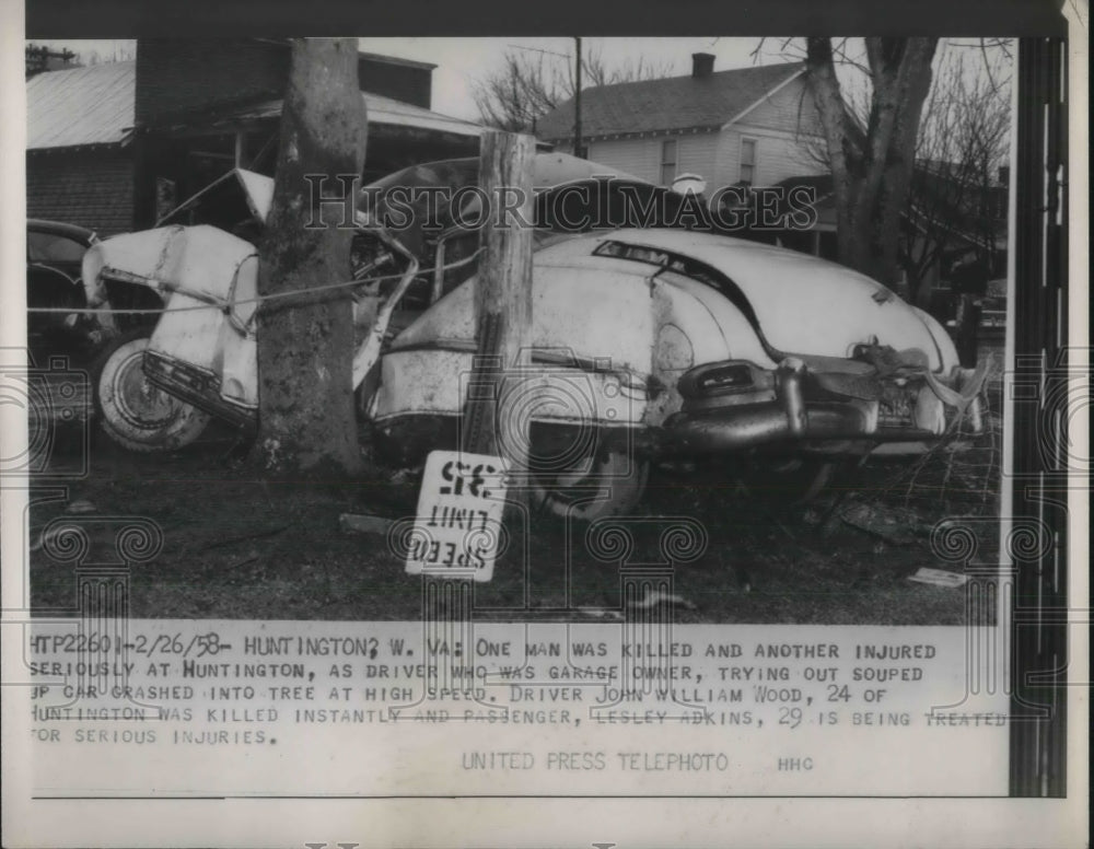 1958 Huntingdon, W.Va auto accident at a garage kills 1 - Historic Images