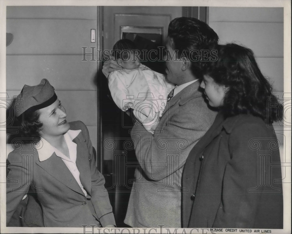 1949 Mr &amp; Mrs Joe Rodriguez &amp; baby after cornea graft - Historic Images