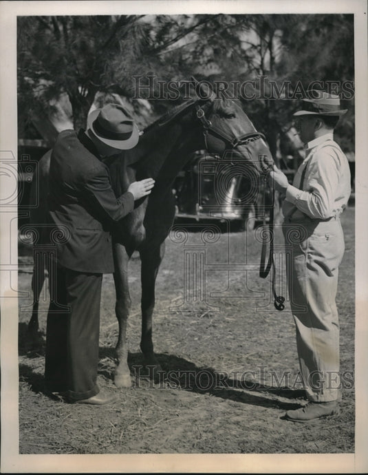 1939 Press Photo Walter Turnier Checks Warlain for Markings in Bertillon System - Historic Images