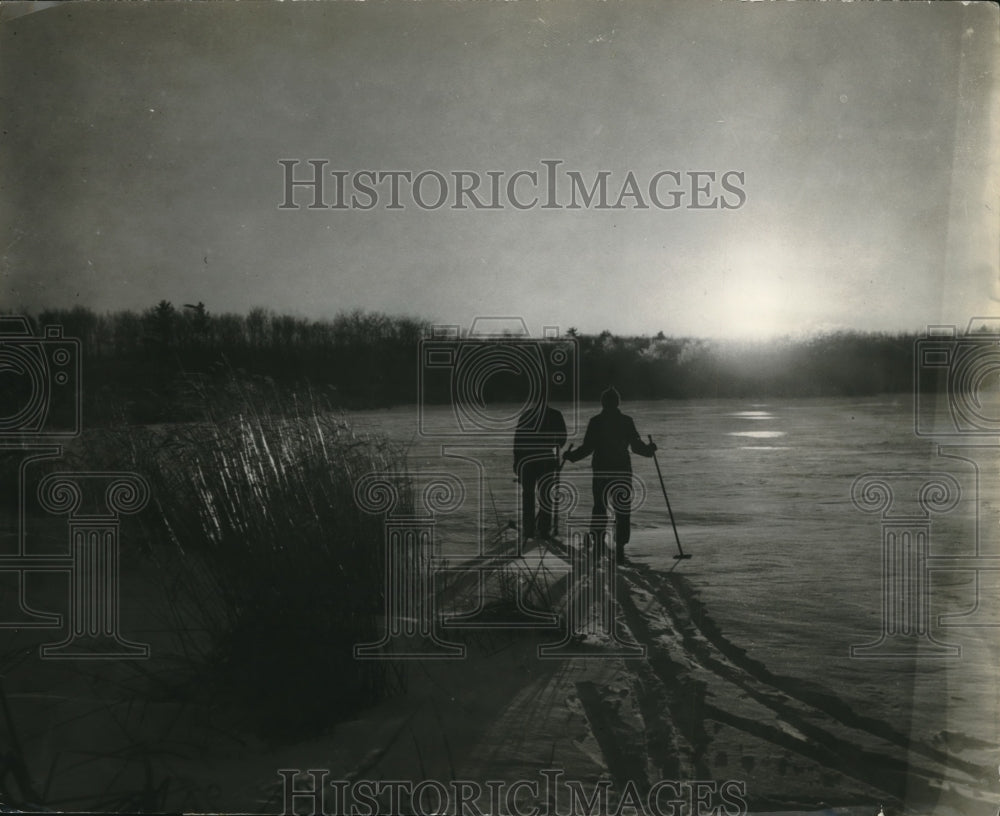 1938 2 Skiers on Frozen Channel at Gull Lake Northern Minnesota - Historic Images