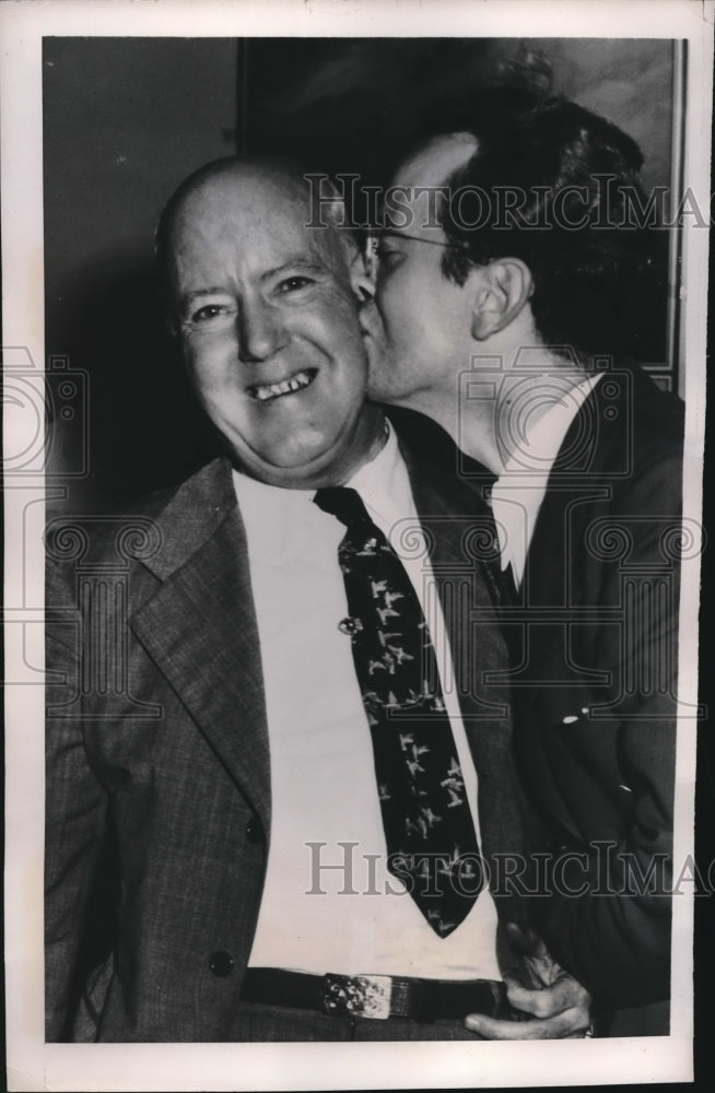 1948 Press Photo Capt. John J. Jackson Kissed by After Being Freed by Killers - Historic Images