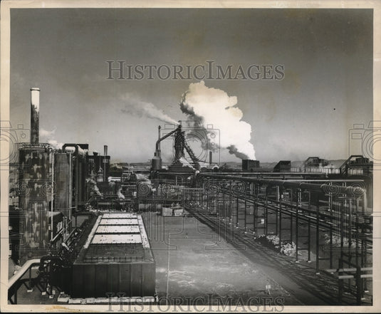 1951 Press Photo A manufacturing plant spewing smoke into the skies - neb93984 - Historic Images