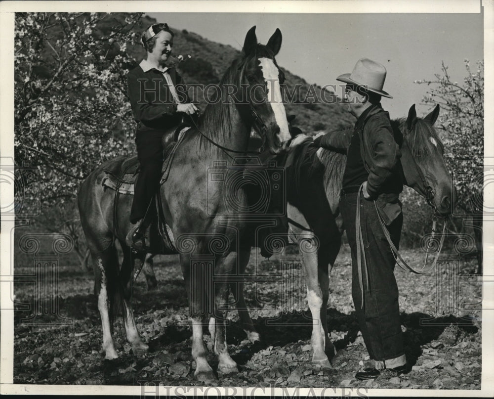 1941 Chicago Cubs vice pres. Boots Weber checks outSanta Clara we - Historic Images