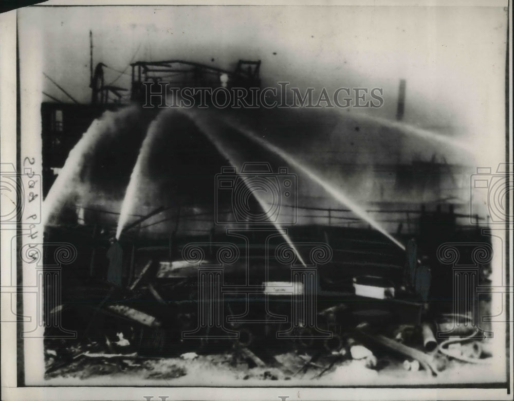 1932 Press Photo Firemen at the scene of a raging fire - neb95364 - Historic Images