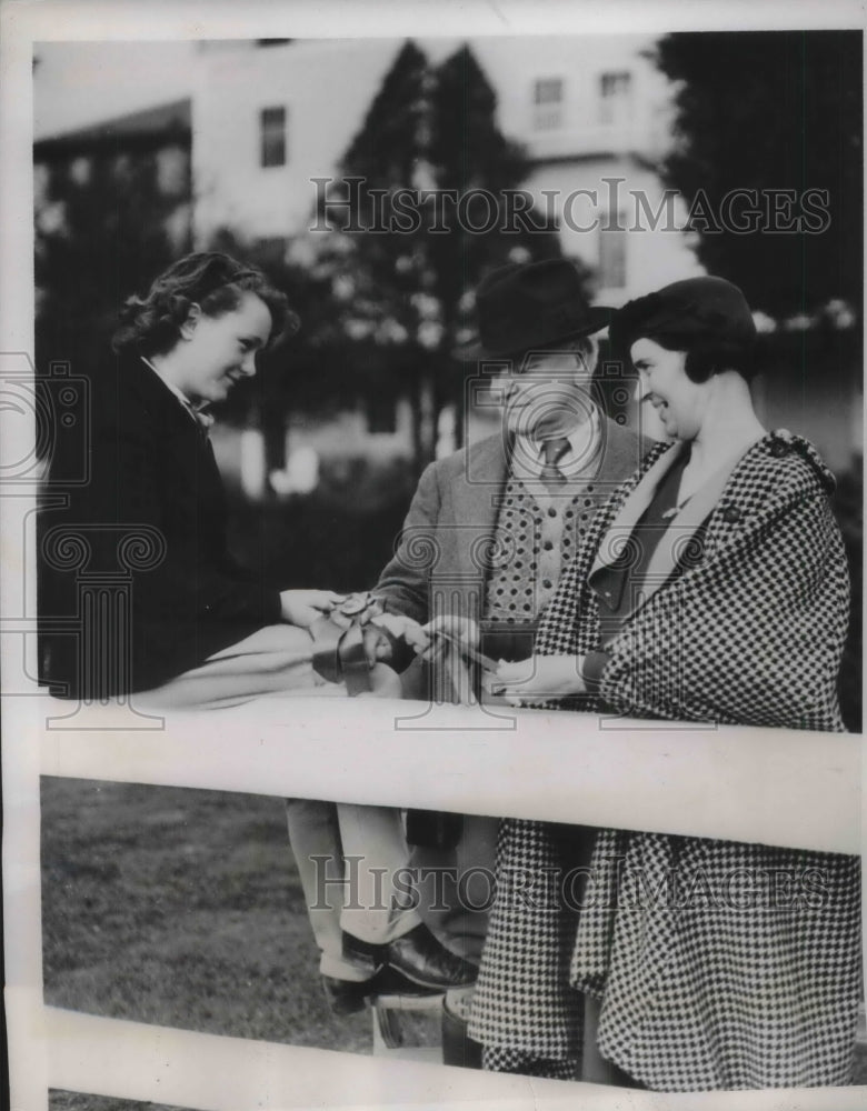 1937 Marion Tyarell and H.V. Tyarell proud parents of winners. - Historic Images