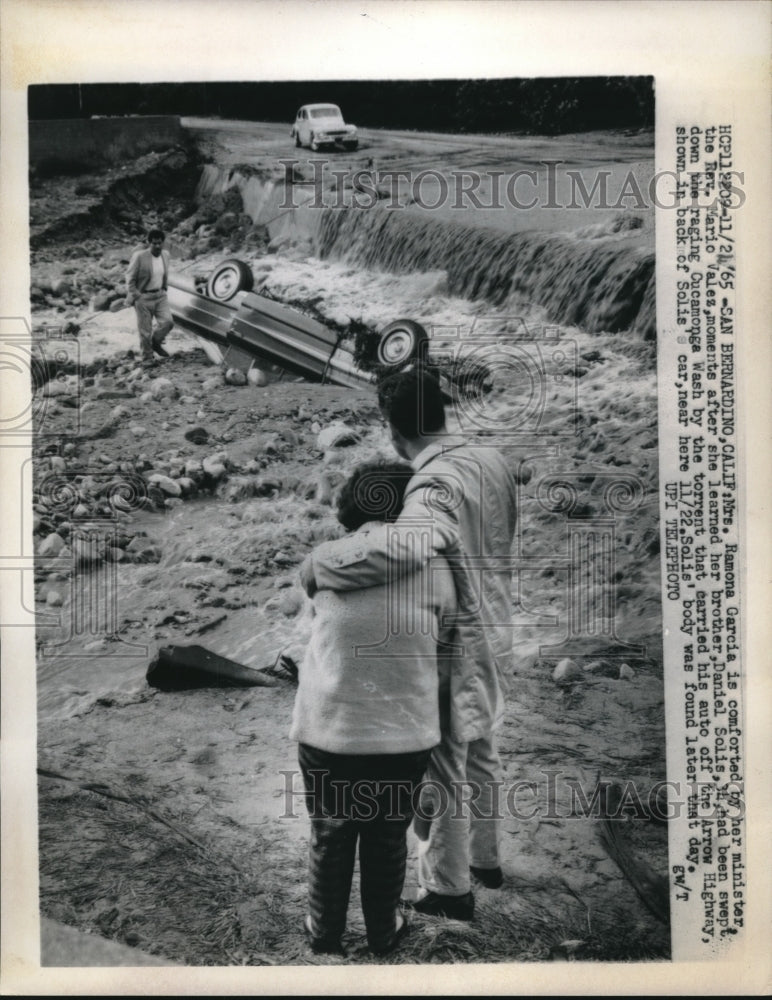 1965 Mrs. Ramona Garcia mourns brother Daniel swept away in flood - Historic Images