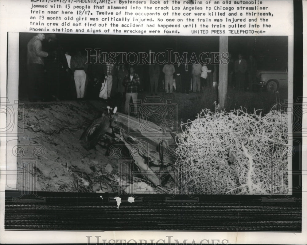 1955 Press Photo Bystanders look at remians of auto jam-Historic Images