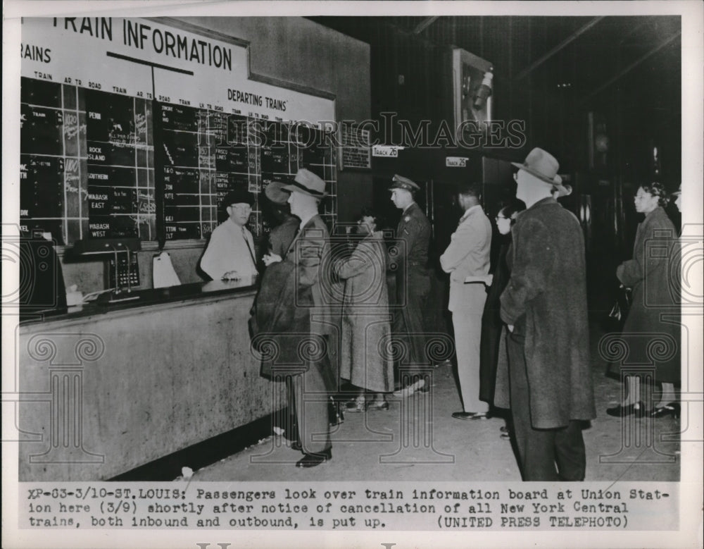 1952 Passenger learn that trips cancelled in NYC Union Station - Historic Images