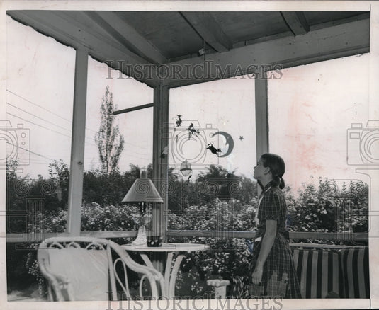 1953 Press Photo Mobiles on a Screened Porch - neb96944-Historic Images