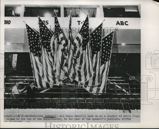 1952 Press Photo John Reimer & Neale Roach Examine Flag Display at Amphitheater - Historic Images