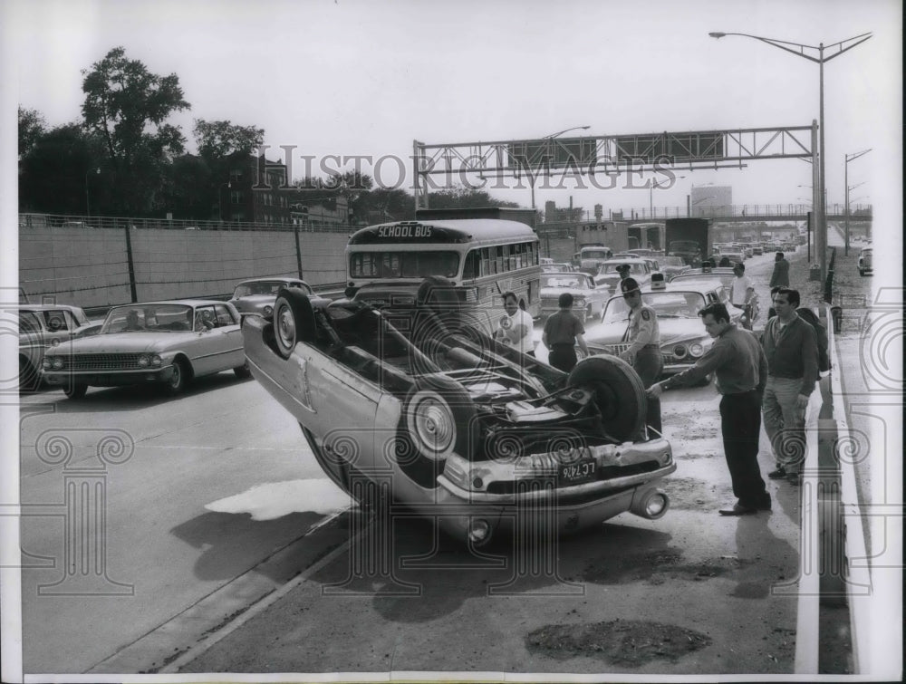 1961 Chicago, Ill Congress St auto flipped upside down - Historic Images