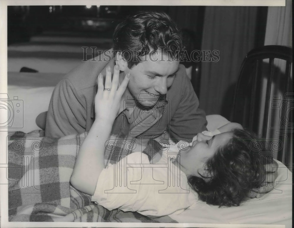 1941 Mrs. Frances Adams, 20, holds up 4 fingers to Edward - Historic Images