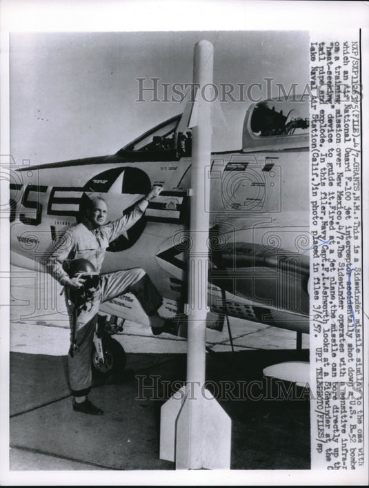 1961 Navy Captain Ashworth Stands With Sidewinder Missle and B - Historic Images