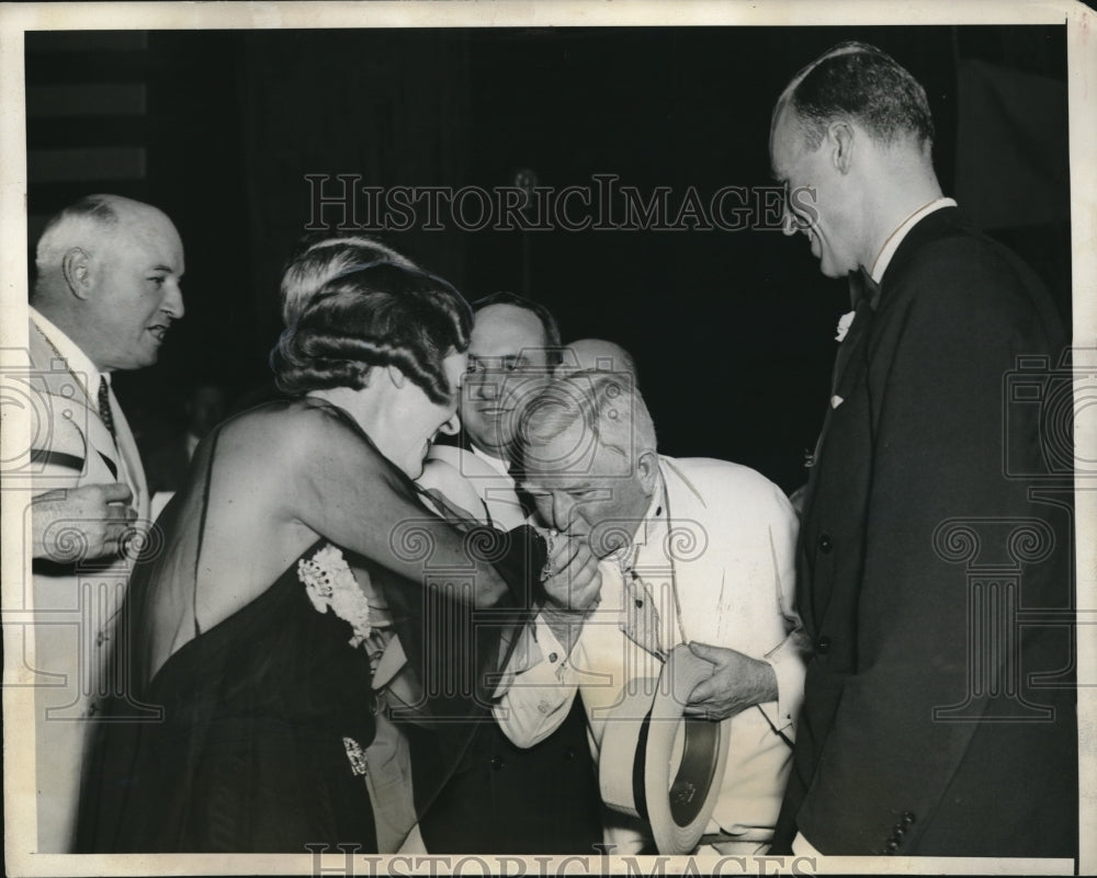 1936 Press Photo Vice Pres Garner kissing hand off Mrs George Earle - Historic Images