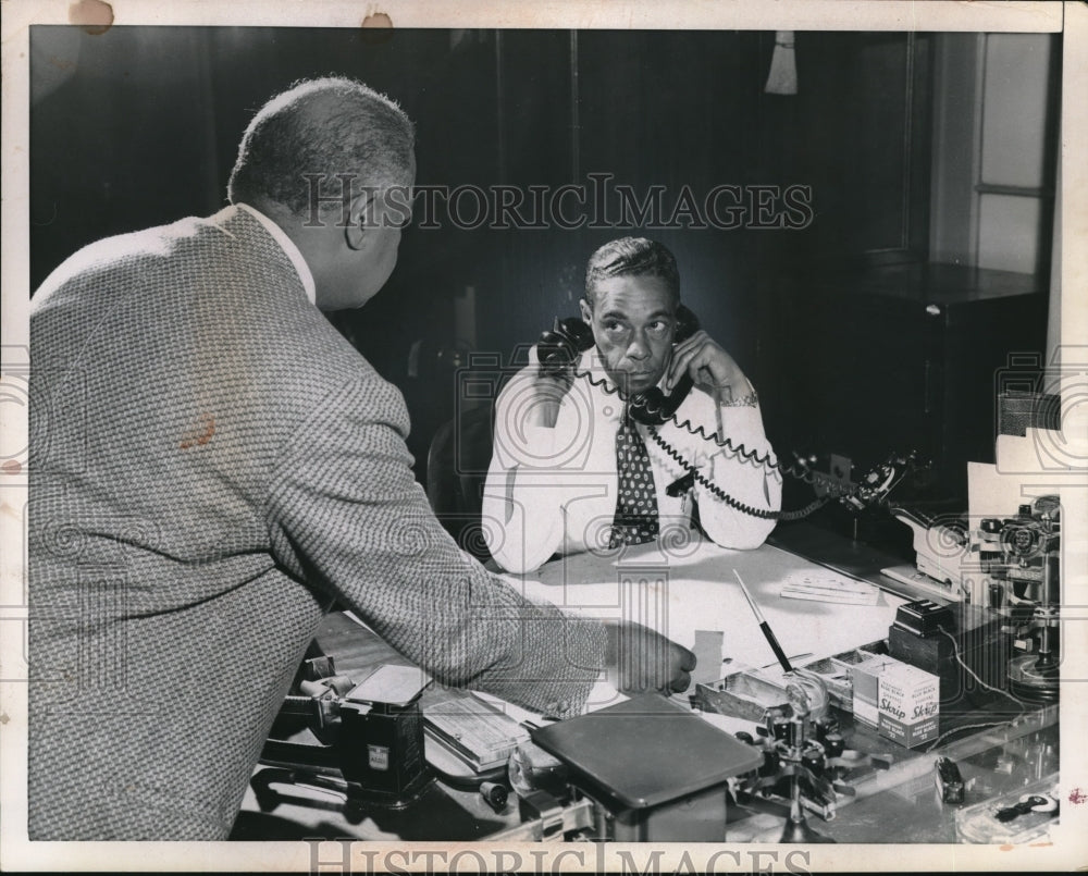 1957 Chief messenger Orris M Nash Juggling Phones in Basement - Historic Images