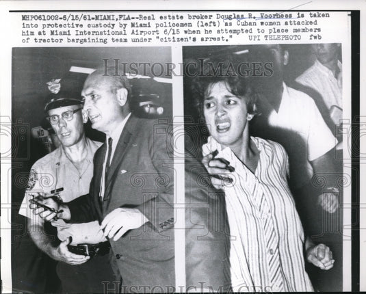 1961 Press Photo Douglas Voorhes Arrested After Cuban Woman Attack Miami Airport - Historic Images