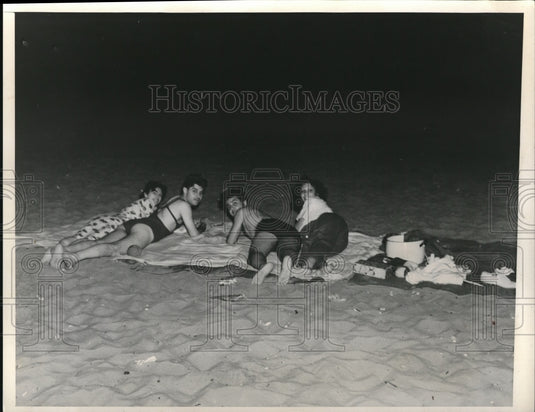 1938 People Laying on a Blanket in Warm Weather - Historic Images