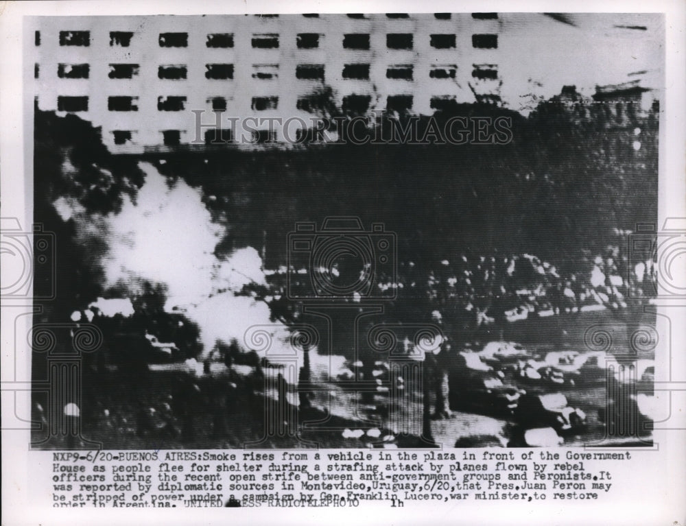 1955 Smoke Rises From Vehicle After Attack by Plane in Buenos Aires - Historic Images