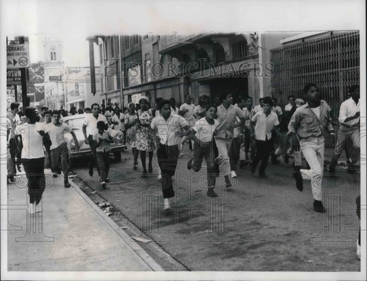1965 Crowd Runs from Trouble in Santo Domingo - Historic Images