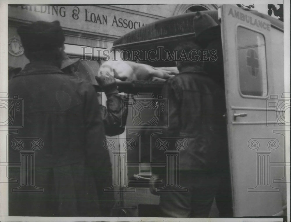 1934 Montrose, Calif. ambulance removes flood victims body - Historic Images