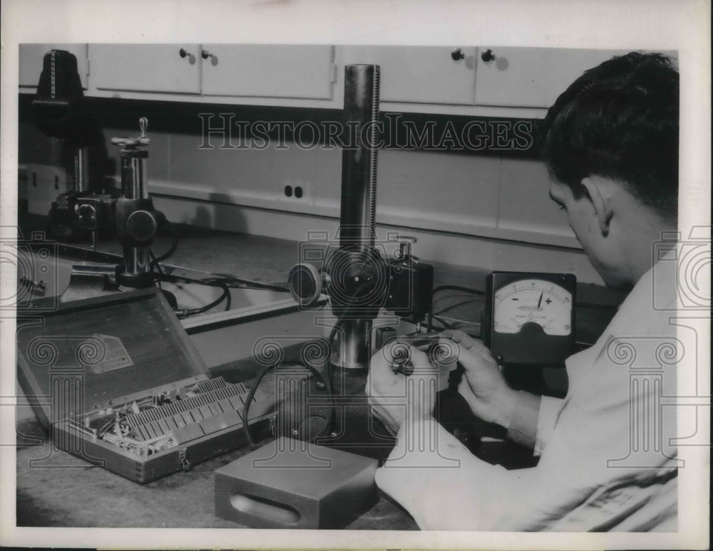 1949 Press Photo Technician Measures Industrial Plus Gage - Historic Images