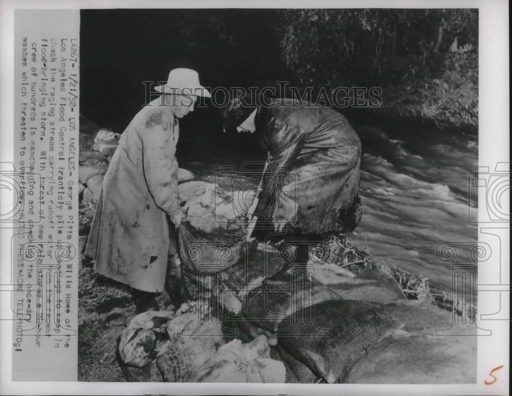 1952 LA, Calif. Geo Pitts &amp; Wills Howe sandbagging vs floodwaters - Historic Images