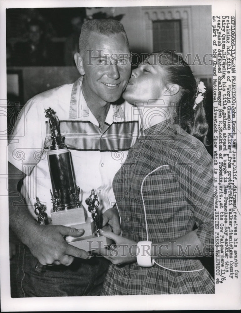 1957 Man receiving award at milking championship in San Francisco - Historic Images