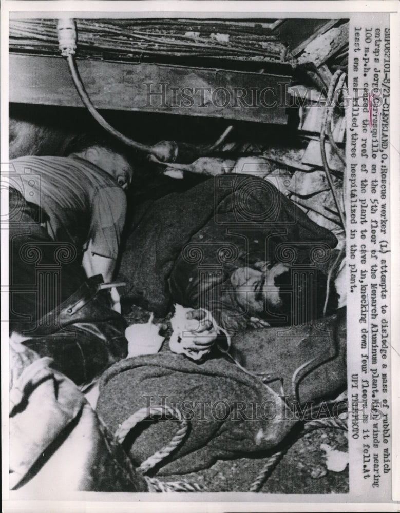 1962 Press Photo Rescue Worker Monarch Aluminum Plant Jorse Carrasquillo - Historic Images