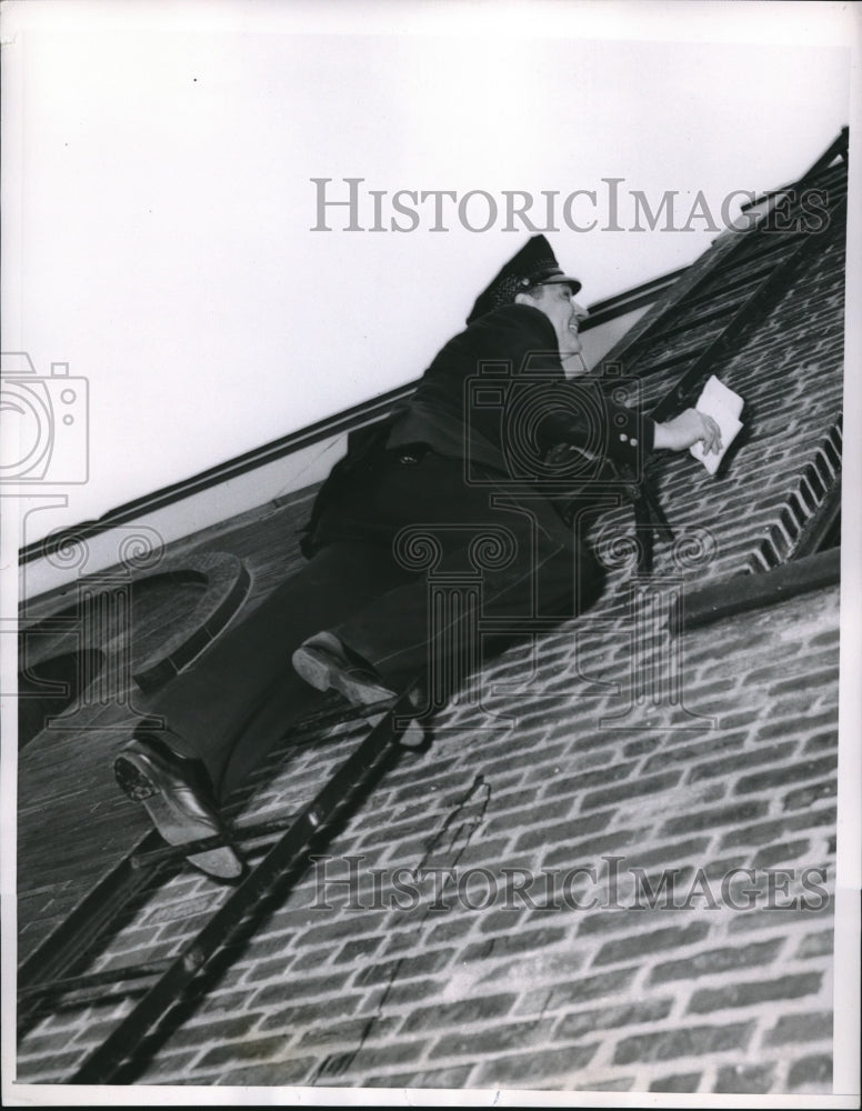 1957 Press Photo Policeman Edward Bourke Climbs Ladder At Railway Station-Historic Images