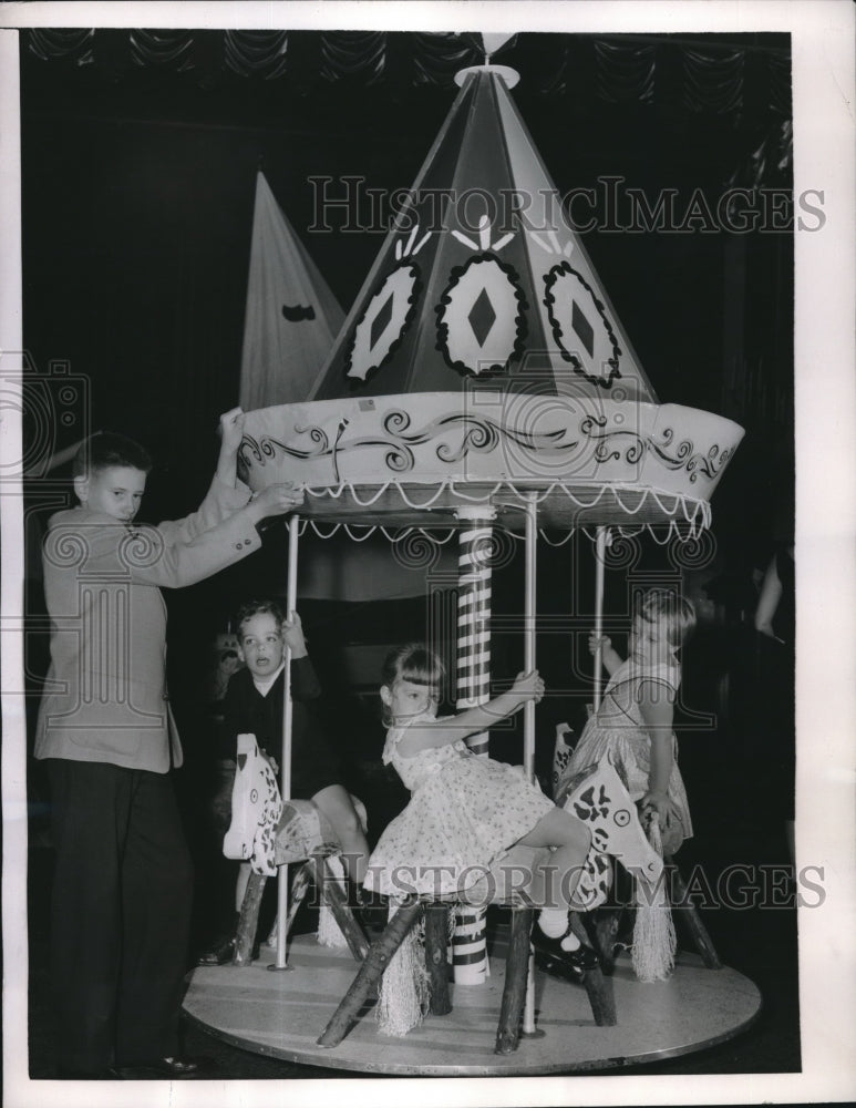 1956 NYC, Rbt Byrne &amp; carousel, M puzo,C Whittle,J Stone - Historic Images