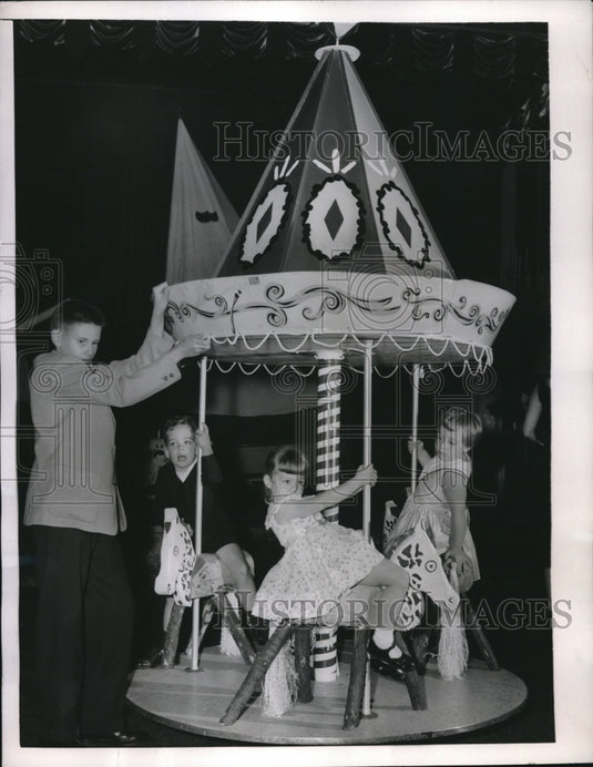 1956 NYC, Rbt Byrne & carousel, M puzo,C Whittle,J Stone - Historic Images