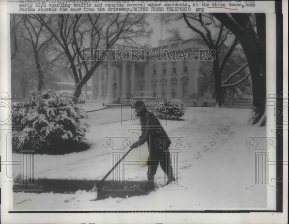 1957 John pustka shoveling snow at the White House - Historic Images