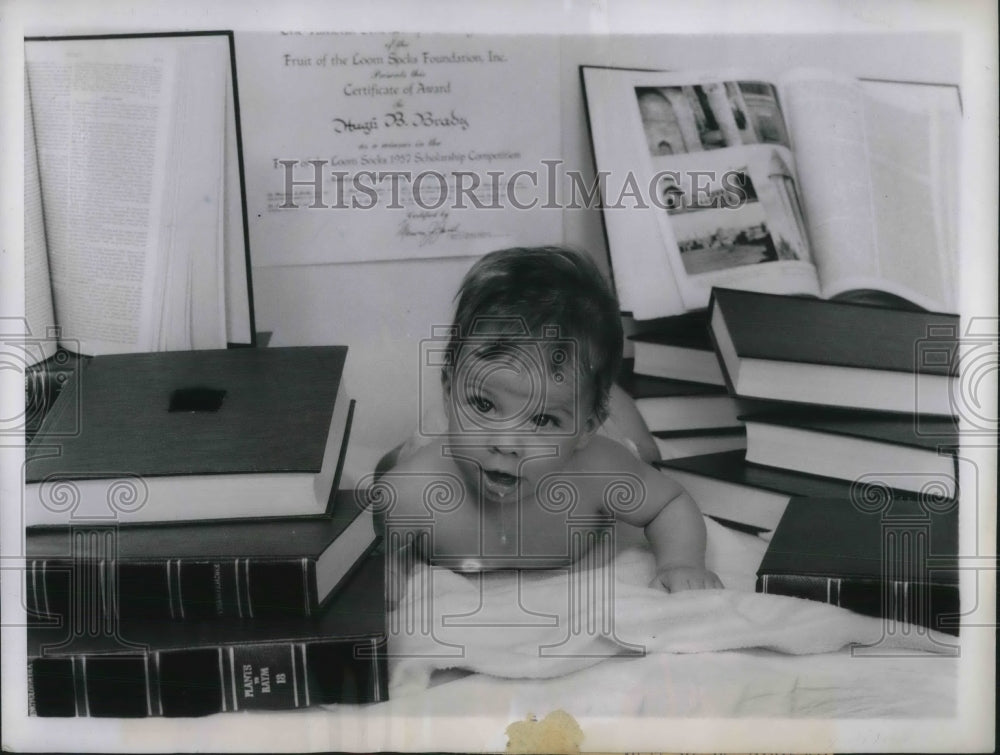 1957 Press Photo NYC, Hugh Brady, 3 months old &amp; encyclopedias - Historic Images