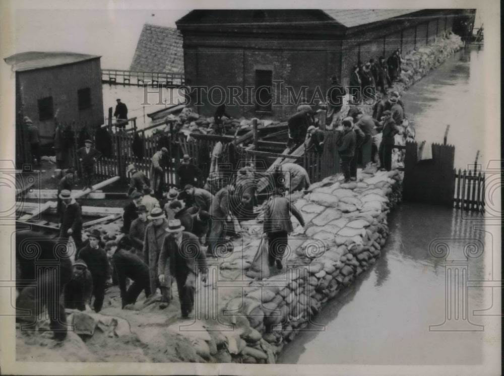 1936 Workers at Holyoke, Massachusetts protect against flood waters-Historic Images