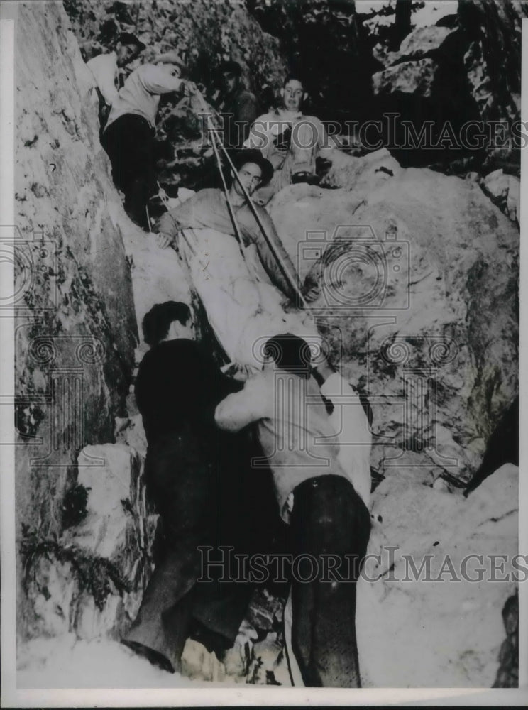 1938 Roger Carney on Stretcher Compund Fracture to Leg Being Rescued - Historic Images