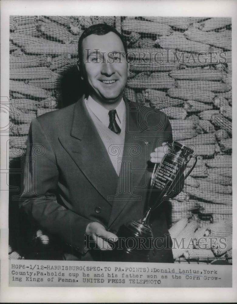 1954 Press Photo Harrisburgh, Pa Donald Lanius &amp; coirn growing trophy - Historic Images