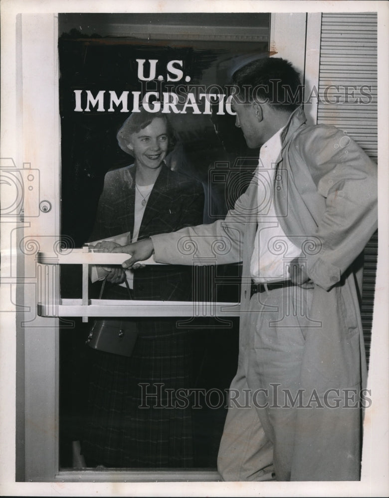 1955 Press Photo SAndra MacDonald, Sgt Ed Orlosky at Immigration in Cleveland-Historic Images